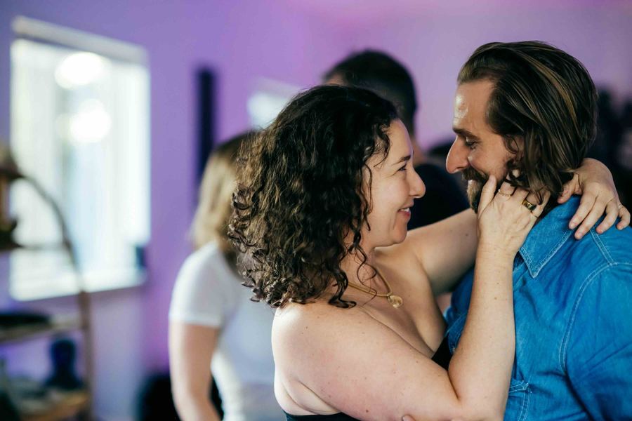 A couple embracing and laughing